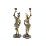 Pair of gilded spelter Knight candlesticks on circular bases H37cm Condition Report &