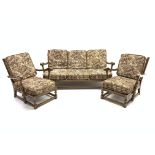 Ercol old colonial Yorkshire elm three piece lounge suit, comprising two easy armchairs,