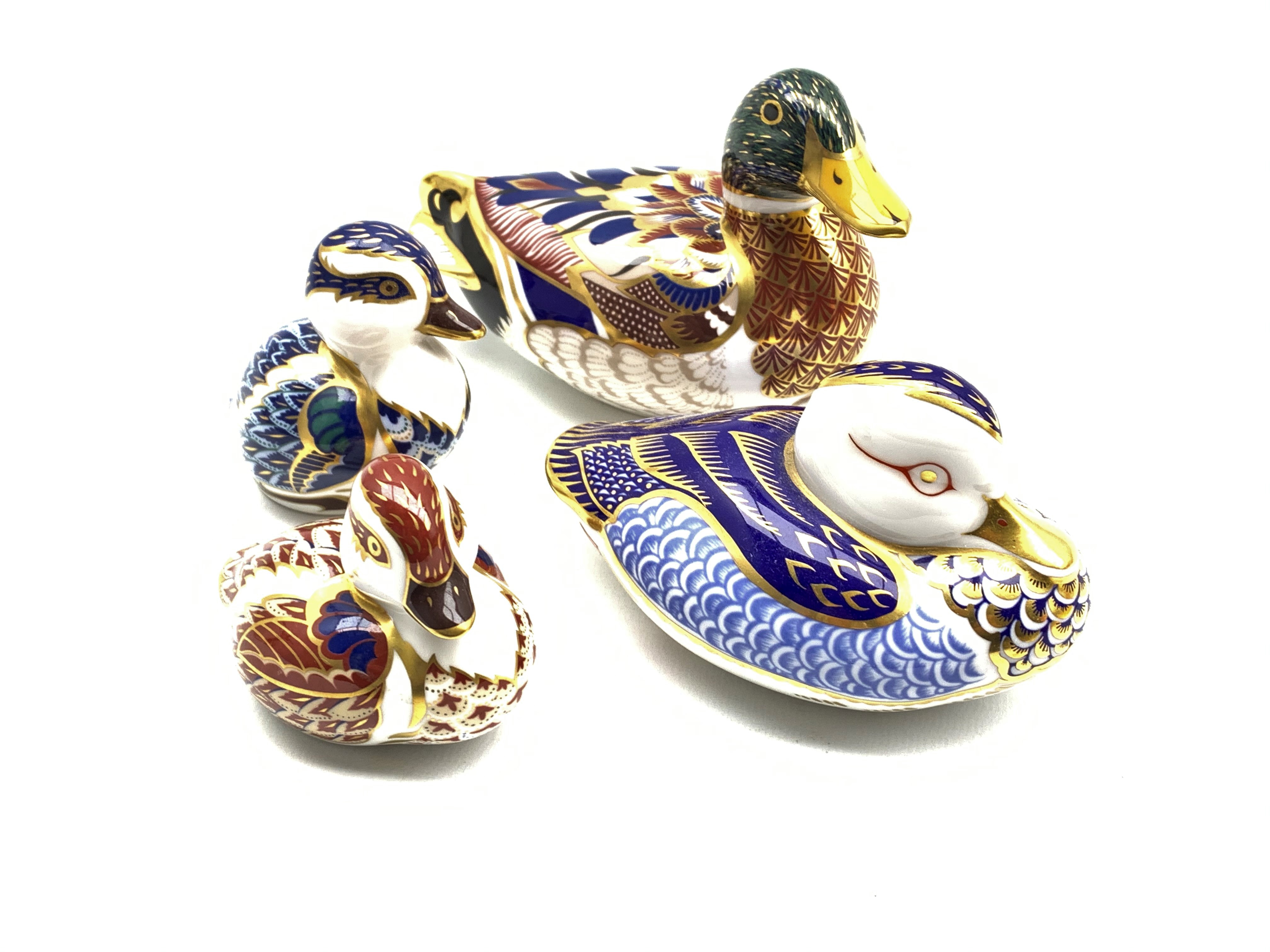 Four Royal Crown Derby duck paperweights,