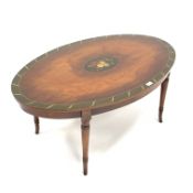 Regency design mahogany coffee occasional table of oval form, with floral painted panel,