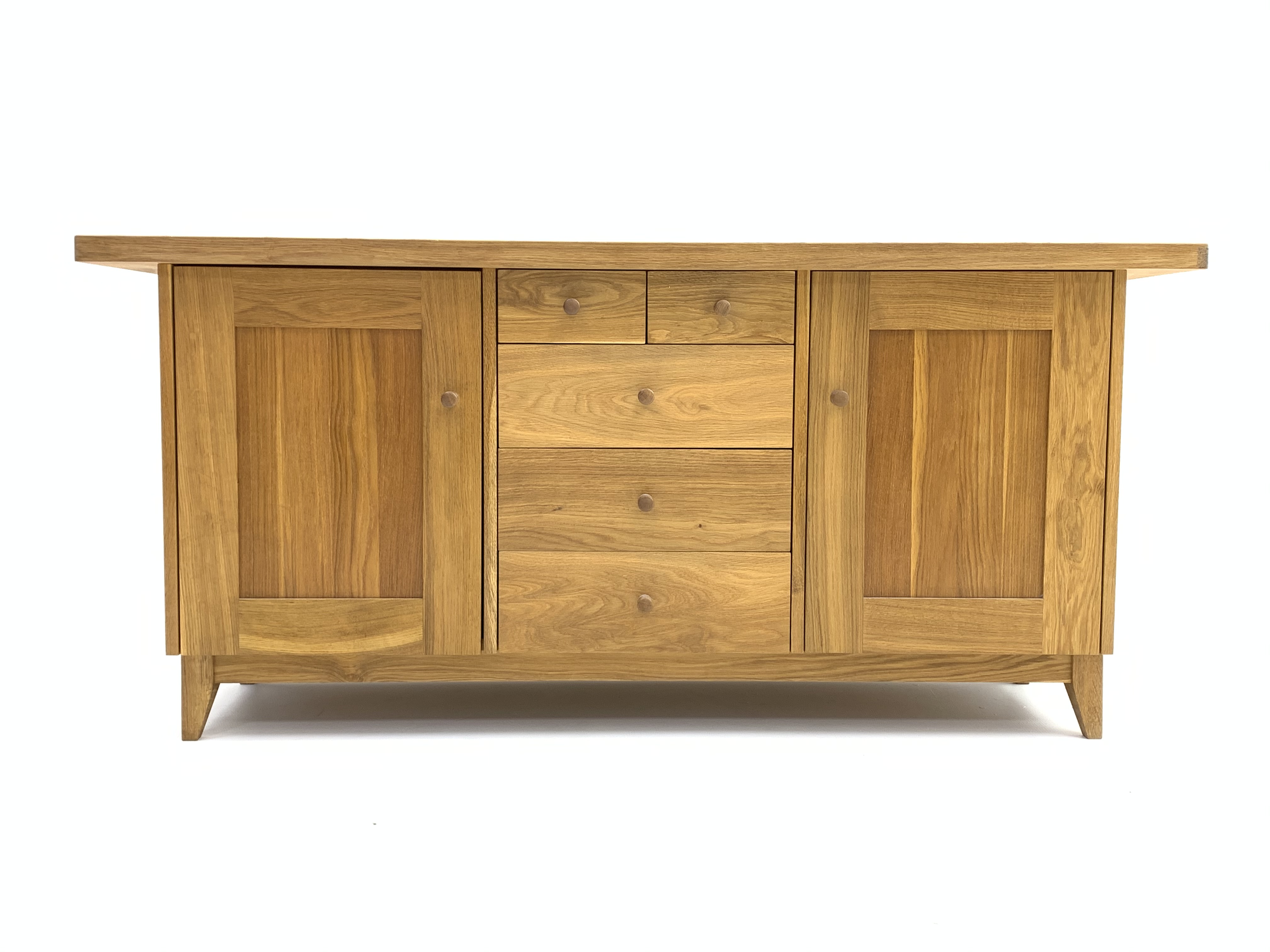 Modern solid light oak sideboard, rectangular top above two short and three long drawers,