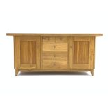 Modern solid light oak sideboard, rectangular top above two short and three long drawers,