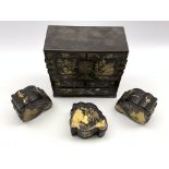 Japanese black lacquered and gilt miniature table cabinet fitted with small drawers W23cm and three