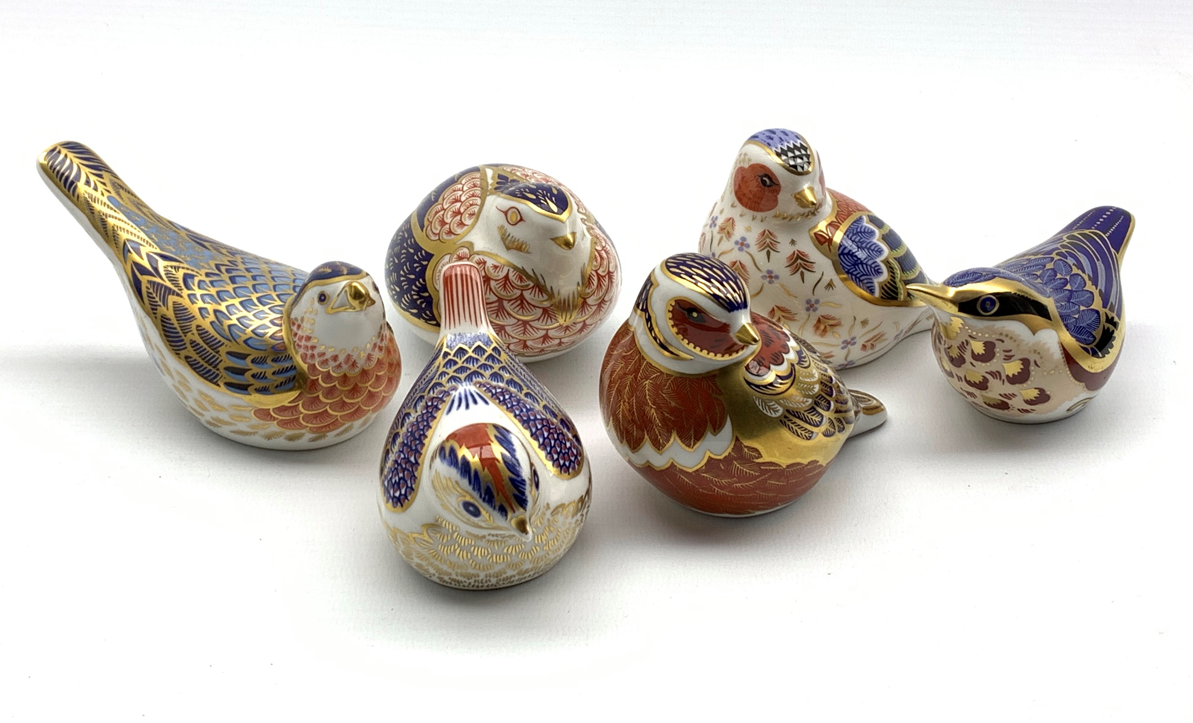 Six Royal Crown Derby bird paperweights,