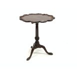 George III mahogany occasional table, shaped moulded tilt top raised on turned column,