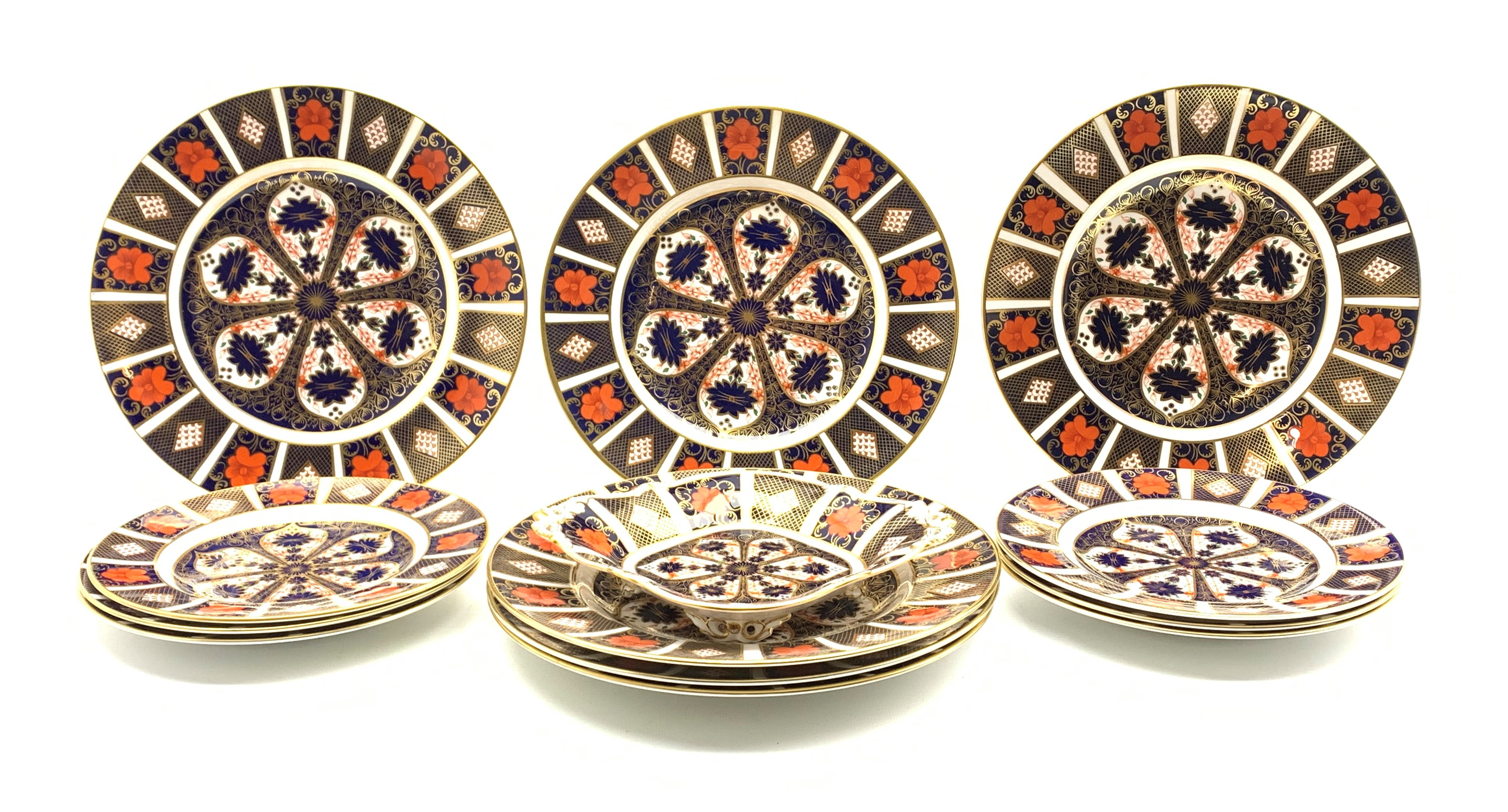 Six Royal Crown Derby dinner plates, six side plates and a bon bon dish,