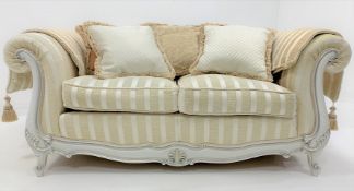 French style two seat sofa, arched back, scrolled arms, squab cushions,