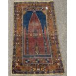Caucasian design prayer rug, red mihrab on blue field, geometric pattern to border,