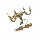 19th century gilt wood six light chandelier, with leaf carved scroll arms,