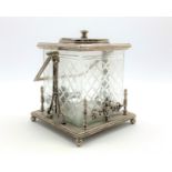 Square glass biscuit barrel in plated frame with swing handle H18cm Condition Report &