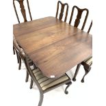 Georgian mahogany drop leaf dining table, the top with rounded corners,