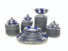 Extensive Victorian earthenware dinner service with a crest 'Spe Tutiores Armis' within a blue and