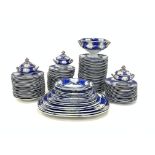 Extensive Victorian earthenware dinner service with a crest 'Spe Tutiores Armis' within a blue and