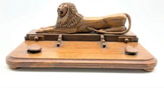 Italian Prisoner of war wooden ink stand with a carved lion,