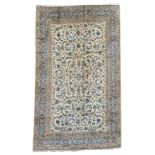 Large Persian Kashan beige carpet, ivory field decorated with trailing foliate,