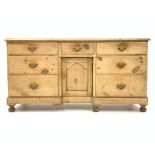 Victorian pine sideboard, with one short and six long graduating drawers,