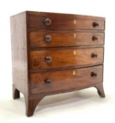 Small George III mahogany bow front chest of four long graduating drawers,