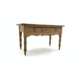 Victorian pine side table, three frieze drawers with glass handles, shaped apron, turned supports,