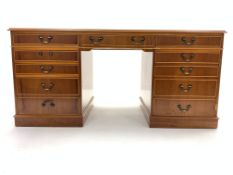 20th century yew wood twin pedestal desk, moulded top with inset leather writing surface,
