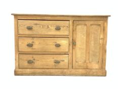 Late 19th century pine sideboard, with three long drawers beside panelled door enclosing one shelf,