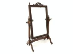 Victorian cheval mirror in mahogany frame, with candle sconces, on splay supports,