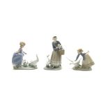 Three Lladro figures, shepherdess with ducks '4568', H24cm,