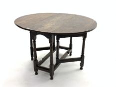 18th century oak drop leaf gate-leg table, oval top raised on turned supports with stretchers,