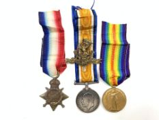 WWI medal trio comprising 1914-15 star, British War Medal and Victory medal, awarded to '200114 SJT.