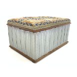 Victorian walnut ottoman, needlework upholstered top hinged to reveal paper lined interior,