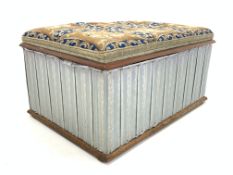 Victorian walnut ottoman, needlework upholstered top hinged to reveal paper lined interior,