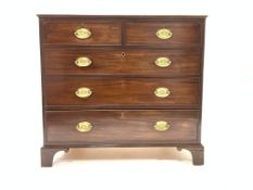 George III mahogany chest of two short and three long graduating drawers, shaped bracket feet,