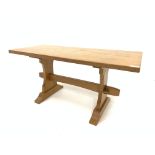 'Squirrelman' Yorkshire oak coffee table, with rectangular adzed top above shaped panel ends,