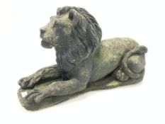 Composite stone recumbent lion garden ornament,