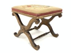 William IV Walnut framed stool, floral needlework top on 'X' framed supports, 52cm x 49cm,