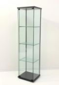 Glass display cabinet, with three shelves, on ebonised base, W43cm, H164cm,