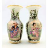 Pair of 19th Century Paris porcelain vases painted with seated male and female Chinese figures