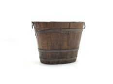 19th century oak and metal banded oval barrel planter, with carry handle to each end,