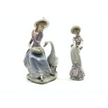 Two Lladro figures, goose trying to eat '5034',