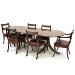 Regency style inlaid mahogany twin pedestal dining table,