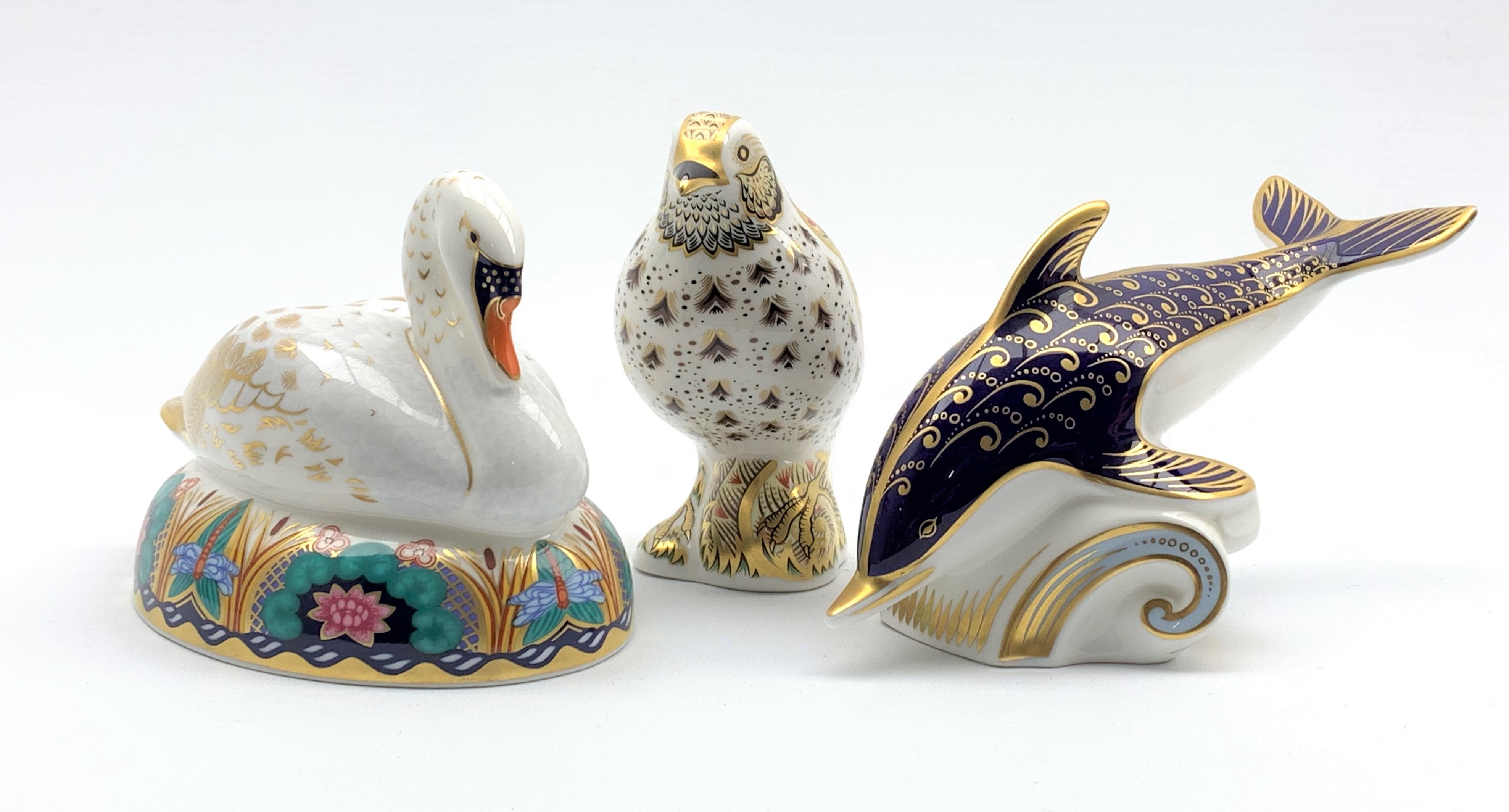 Royal Crown Derby 'Swan' and 'Dolphin' paperweights,