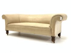 Late Victorian Chesterfield settee, lined ready for covering, on turned oak supports,