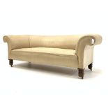 Late Victorian Chesterfield settee, lined ready for covering, on turned oak supports,