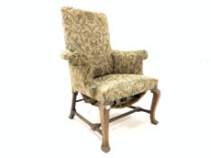 Early 18th century walnut and beech framed armchair, with upholstered seat and back, swept arms,