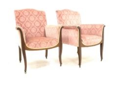 Pair late 19th century mahogany framed easy chairs, upholstered in pink velvet, panel arms,