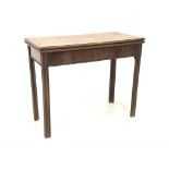 George III mahogany tea table of Chippendale design, fold over top with moulded edge,