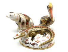 Royal Crown Derby 'Crocodile', 'Brown Pelican' and Imari 'Polar Bear' paperweights,