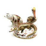 Royal Crown Derby 'Crocodile', 'Brown Pelican' and Imari 'Polar Bear' paperweights,