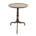 Georgian mahogany tilt top occasional table, circular top with raised edge above ring turned column,