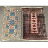 Persian Bokhara ground rug, gul motif, repeating border (185cm x 123cm) and a Turkish design rug,