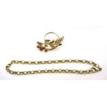 9ct gold ruby leaf design brooch hallmarked and a 9ct gold cable link chain bracelet stamped 375